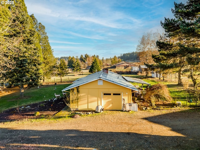 view of outbuilding with a garage