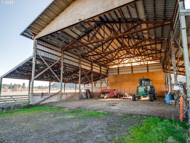 view of stable featuring a rural view