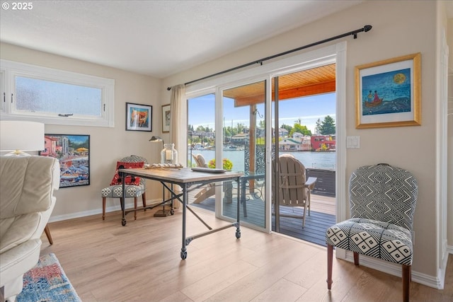 460 N Tomahawk Island Dr, Portland, OR 97217 - office featuring a water view and light wood-type flooring