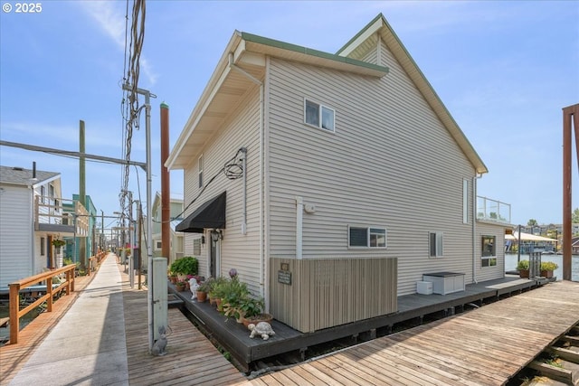 460 N Tomahawk Island Dr, Portland, OR 97217 - view of property exterior with a wooden deck