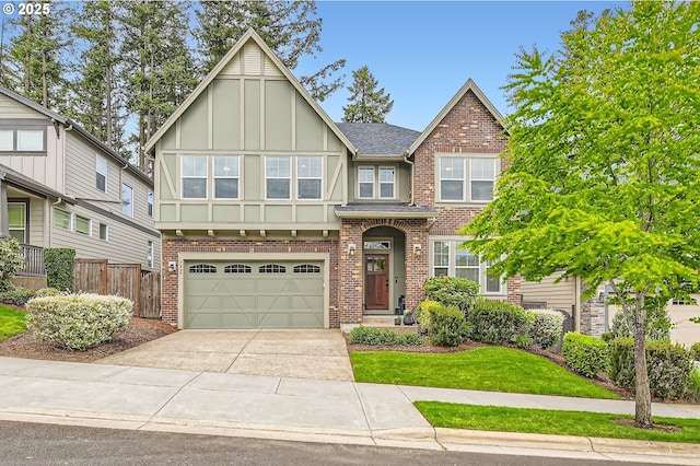 view of front facade with driveway, a garage, fence, brick siding, and roof with shingles