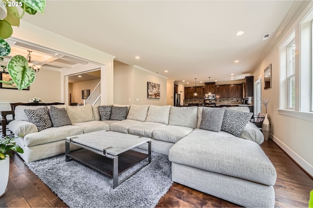 living room featuring recessed lighting, a chandelier, dark wood finished floors, stairway, and baseboards