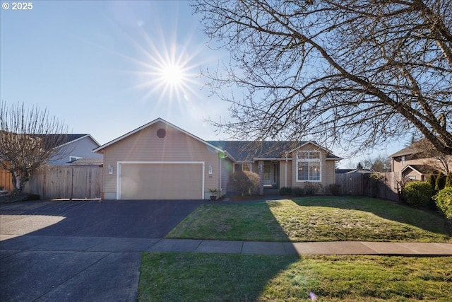 ranch-style home featuring a garage and a front yard