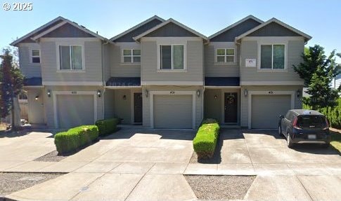 Catron St, Monmouth, OR 97361 - view of front of property with driveway and a garage