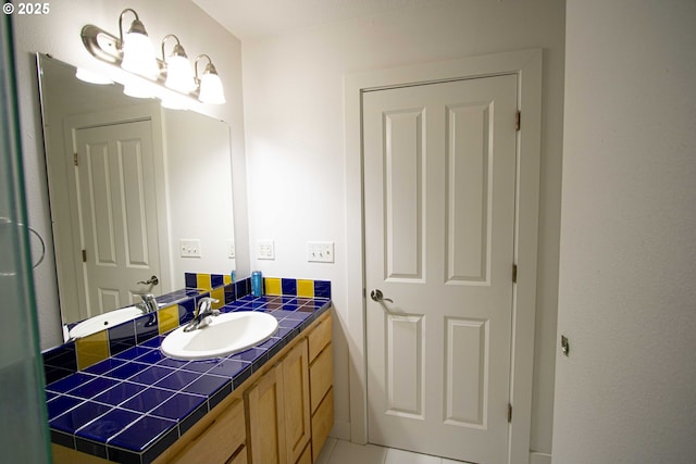 1072 53rd St, Springfield, OR 97478 - bathroom with vanity and tile patterned flooring