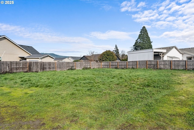 view of yard with fence