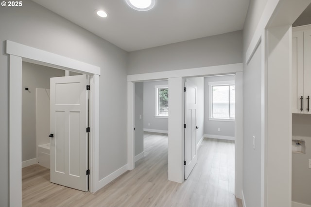 7320 Tanglewood Ave, Gleneden Beach, OR 97388 - hallway with light wood finished floors and recessed lighting