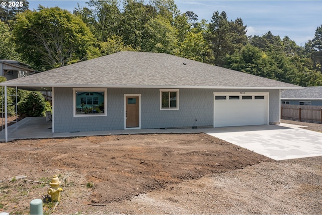 7320 Tanglewood Ave, Gleneden Beach, OR 97388 - ranch-style house featuring a shingled roof, concrete driveway, and an attached garage