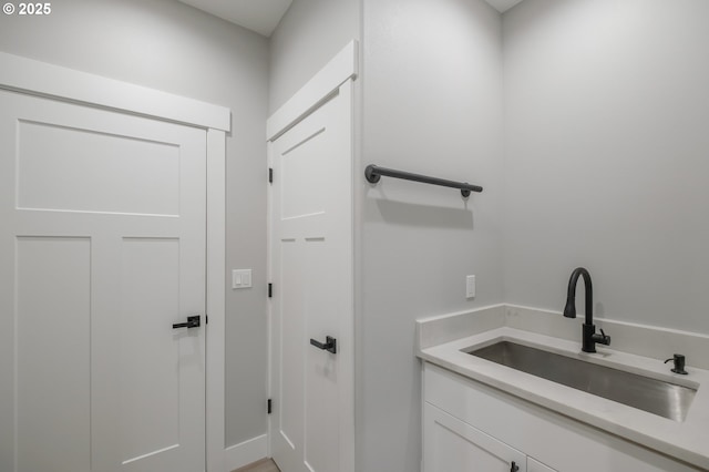 7320 Tanglewood Ave, Gleneden Beach, OR 97388 - laundry room featuring a sink