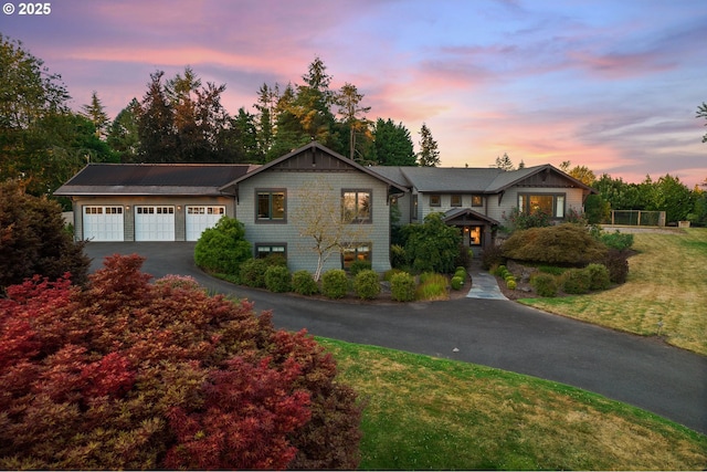 17900 Crestline Dr, Lake Oswego, OR 97034 - view of front of house with asphalt driveway, a yard, and an attached garage