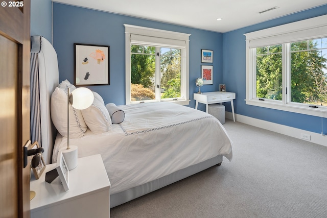 17900 Crestline Dr, Lake Oswego, OR 97034 - bedroom featuring multiple windows, carpet flooring, and baseboards