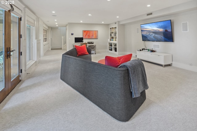 17900 Crestline Dr, Lake Oswego, OR 97034 - living area featuring french doors, light colored carpet, recessed lighting, and baseboards