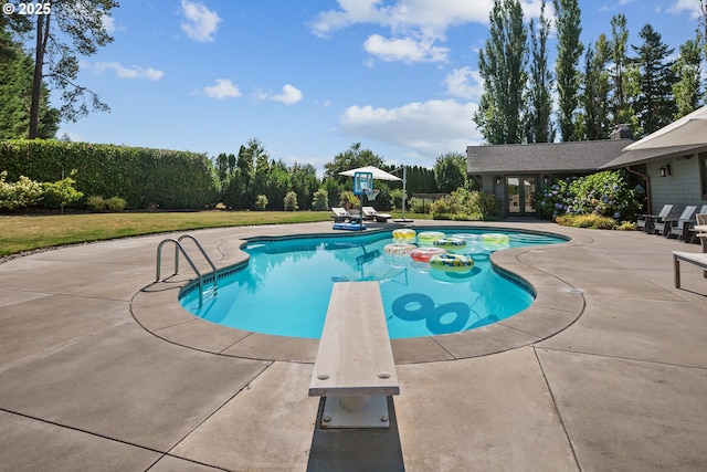 17900 Crestline Dr, Lake Oswego, OR 97034 - view of pool featuring a patio area, a diving board, a yard, and french doors