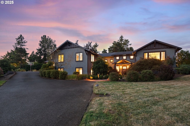 17900 Crestline Dr, Lake Oswego, OR 97034 - view of front of home featuring board and batten siding, driveway, and a front lawn