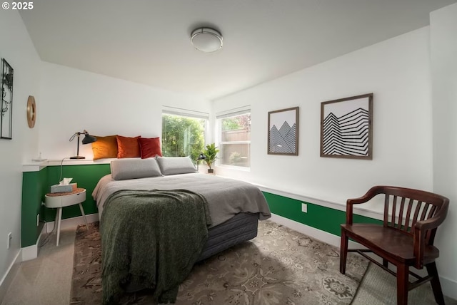 carpeted bedroom with baseboards