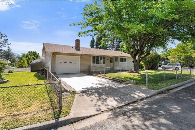 107 N 4th St, Talent, OR 97540 - single story home featuring a fenced front yard, an attached garage, driveway, and a chimney