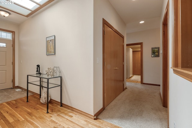 interior space with recessed lighting and baseboards