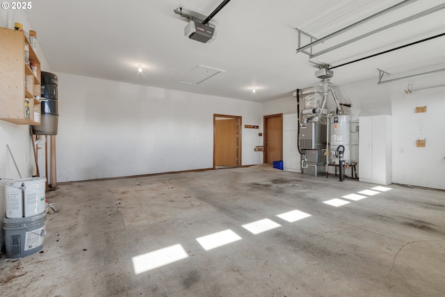 garage featuring heating unit, water heater, and a garage door opener