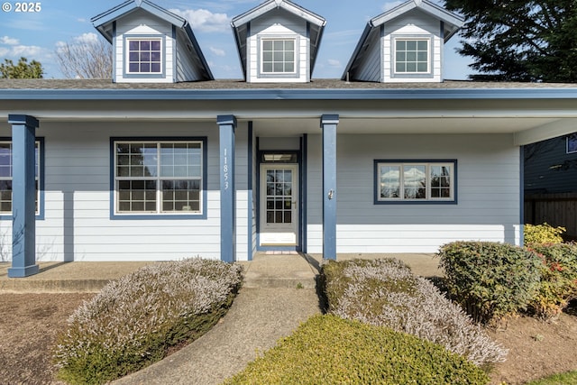 entrance to property with covered porch