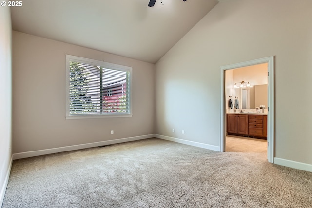 3881 SW Eleven Mile Ave, Gresham, OR 97080 - unfurnished bedroom featuring light colored carpet, connected bathroom, high vaulted ceiling, and ceiling fan