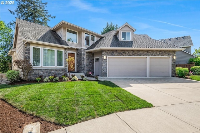 32092 SW Willamette Way E, Wilsonville, OR 97070 - view of front facade with a garage, stone siding, and concrete driveway