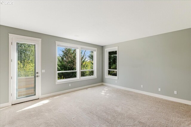 32092 SW Willamette Way E, Wilsonville, OR 97070 - spare room featuring carpet flooring and baseboards