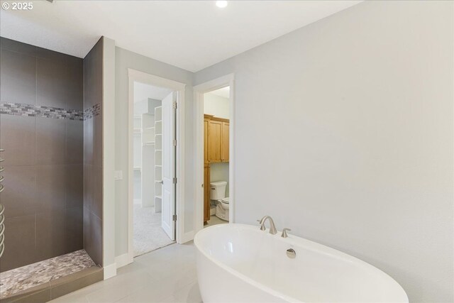 32092 SW Willamette Way E, Wilsonville, OR 97070 - full bath featuring a freestanding tub, toilet, a tile shower, recessed lighting, and baseboards