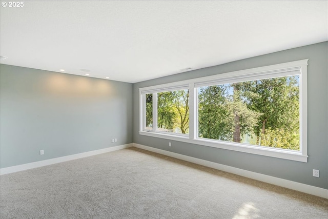 32092 SW Willamette Way E, Wilsonville, OR 97070 - empty room featuring healthy amount of natural light, baseboards, carpet, and recessed lighting