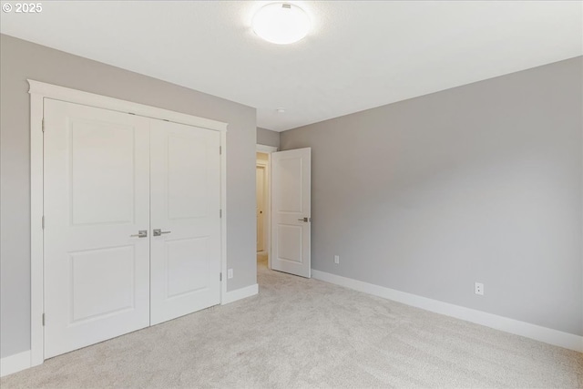 32092 SW Willamette Way E, Wilsonville, OR 97070 - unfurnished bedroom with carpet floors, baseboards, and a closet