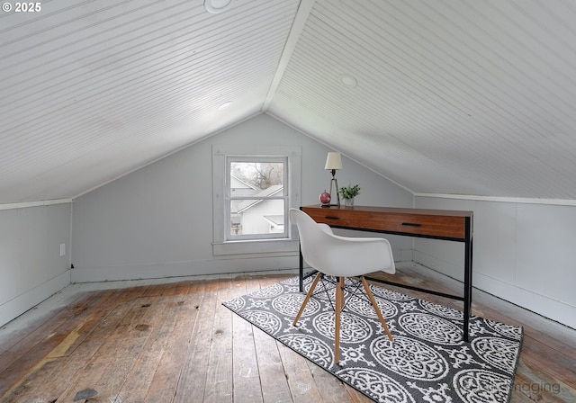 office featuring lofted ceiling and wood-type flooring