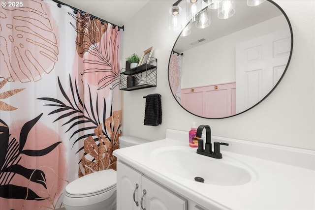 901 SE Olympia Dr, Vancouver, WA 98683 - bathroom featuring toilet, visible vents, vanity, and a shower with shower curtain