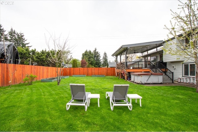 901 SE Olympia Dr, Vancouver, WA 98683 - view of yard featuring a deck, stairway, a hot tub, and a fenced backyard