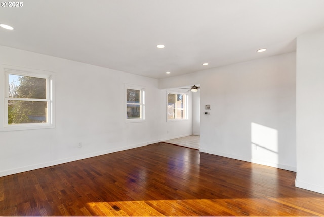 unfurnished room featuring hardwood / wood-style floors