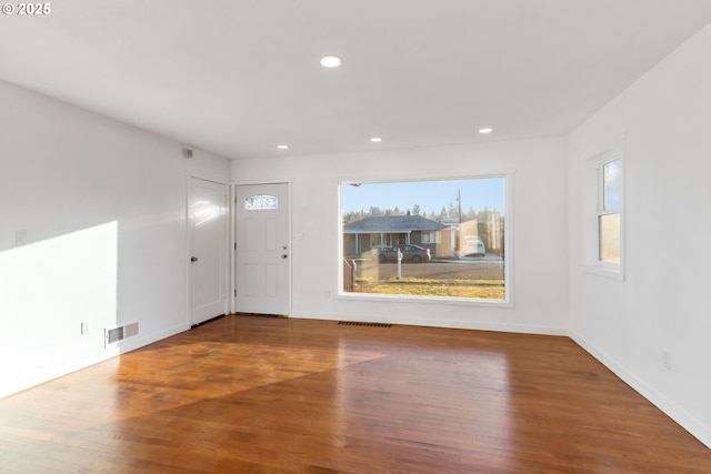 entrance foyer featuring hardwood / wood-style flooring