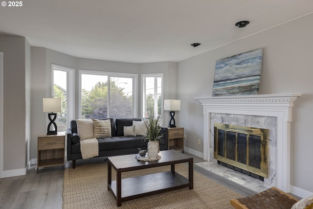 9711 SE Top O Scott St, Happy Valley, OR 97086 - living area with a tile fireplace and wood finished floors