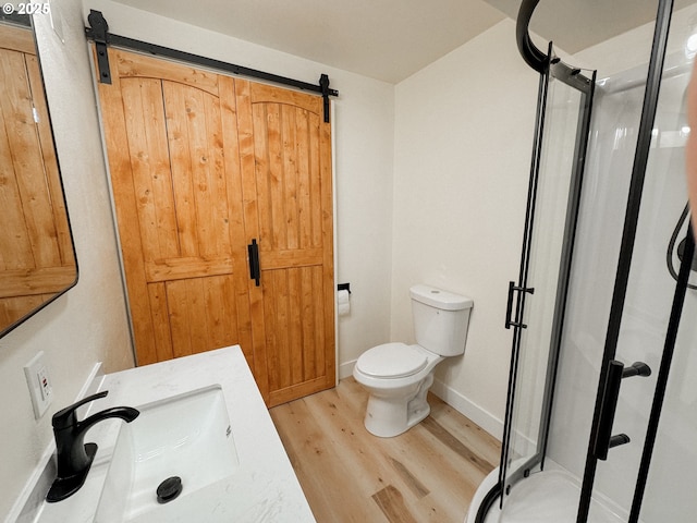 375 Fir Knoll Ln, Salem, OR 97317 - bathroom featuring toilet, a stall shower, and wood finished floors