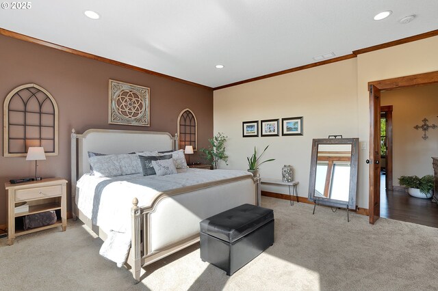 carpeted bedroom featuring recessed lighting, baseboards, and ornamental molding