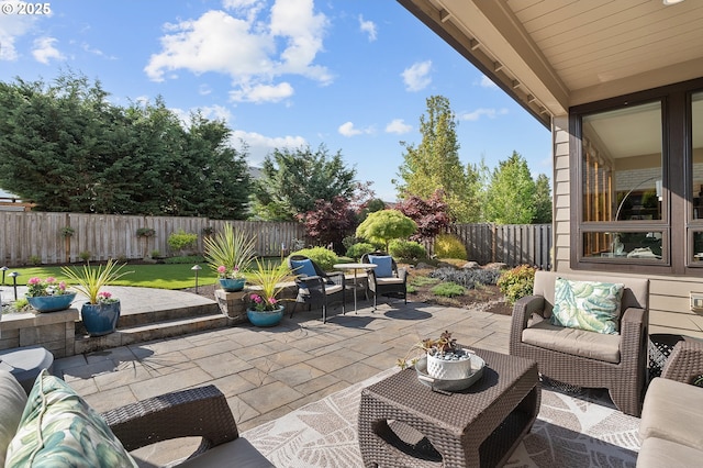 view of patio / terrace featuring a fenced backyard and outdoor lounge area