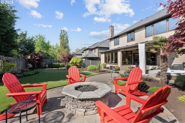 view of patio / terrace featuring a fenced backyard and an outdoor fire pit