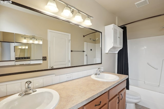 bathroom with shower / tub combo, toilet, and double vanity