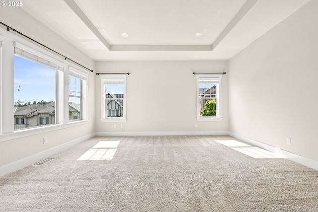 16944 SW Birdsong St, Beaverton, OR 97007 - carpeted spare room with baseboards, a tray ceiling, and recessed lighting