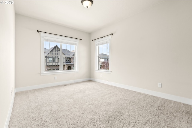 16944 SW Birdsong St, Beaverton, OR 97007 - carpeted empty room featuring baseboards