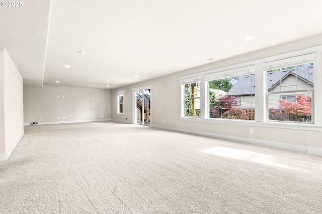 16944 SW Birdsong St, Beaverton, OR 97007 - carpeted empty room with baseboards and recessed lighting