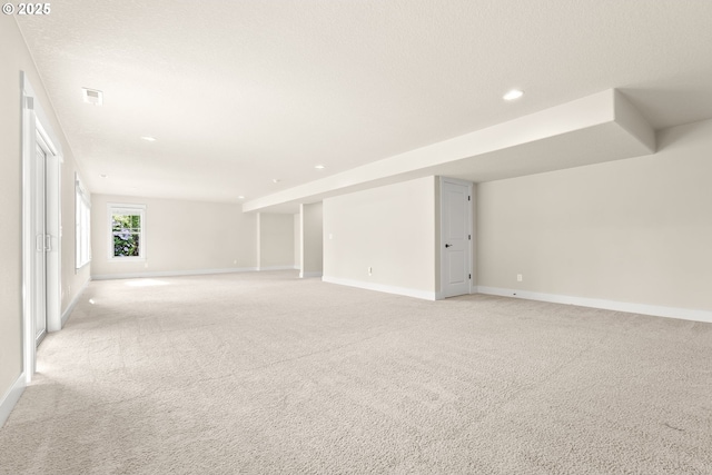 16944 SW Birdsong St, Beaverton, OR 97007 - empty room featuring light carpet, baseboards, and recessed lighting