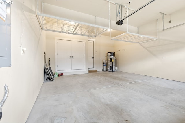 16944 SW Birdsong St, Beaverton, OR 97007 - garage with heat pump water heater, a garage door opener, and electric panel