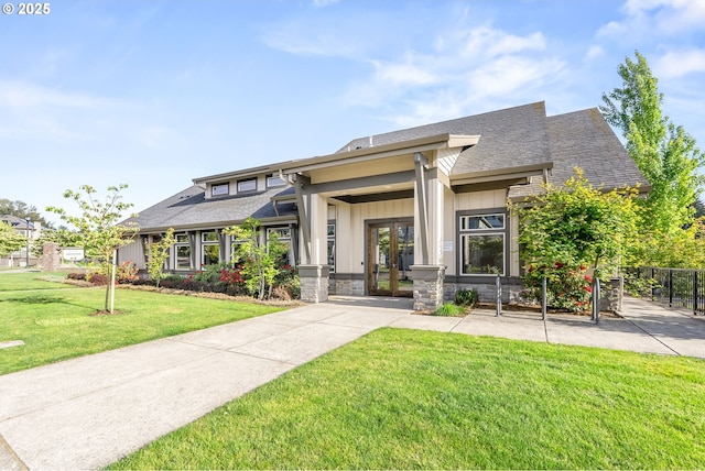 16944 SW Birdsong St, Beaverton, OR 97007 - view of front of property with french doors, stone siding, roof with shingles, and board and batten siding