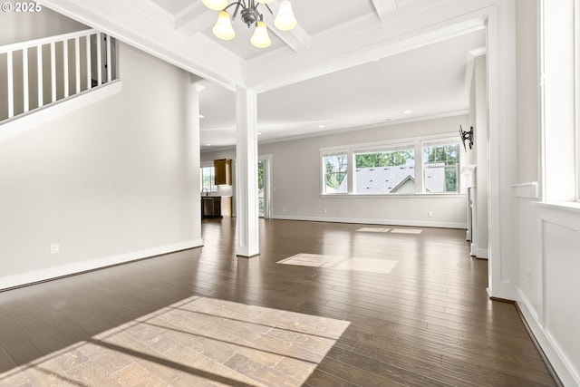 16944 SW Birdsong St, Beaverton, OR 97007 - spare room with a chandelier, ornamental molding, hardwood / wood-style flooring, beamed ceiling, and baseboards