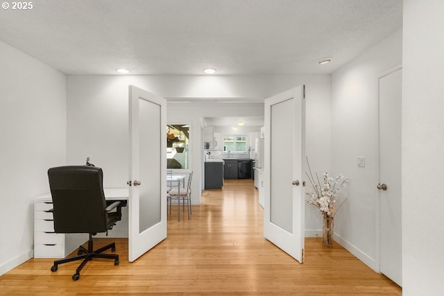 530 N Hayden Bay Dr, Portland, OR 97217 - office with light wood-type flooring, recessed lighting, french doors, and baseboards