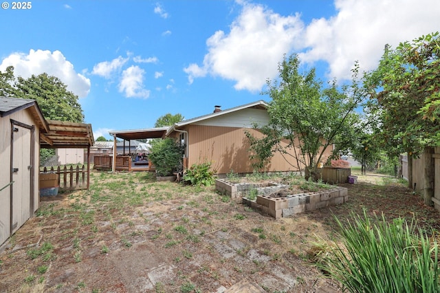 945 Irving Ct, Eugene, OR 97404 - fenced backyard with a garden