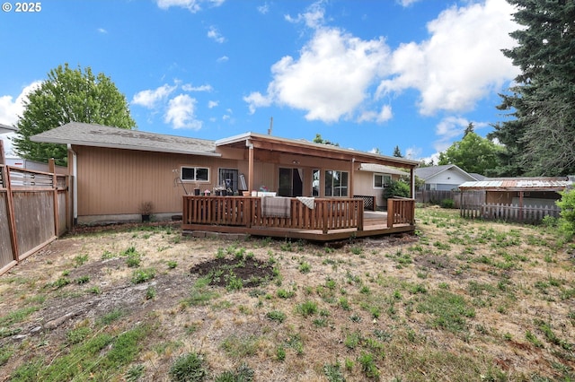 945 Irving Ct, Eugene, OR 97404 - rear view of property featuring a fenced backyard and a deck